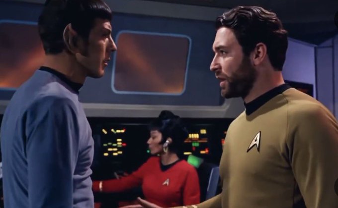 Two Star Trek crew members in gold and blue uniforms stand face-to-face in a tense confrontation on the bridge, while a female officer in a red uniform works at a control panel in the background, echoing the post's reassurance that an outside threat is nothing to worry about.