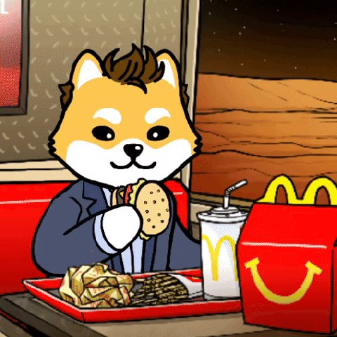 The image features a cartoon dog sitting at a table with a McDonald's meal, which includes a hamburger and fries. The background of the image shows a red wall with a picture hanging above it that says "Join me for a burger on Mars". This suggests that the post is promoting a fictional event or product where people can enjoy a burger together in space.