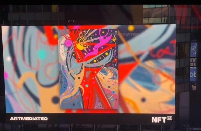 A digital art display showing a vibrant abstract painting with a face, displayed on a large screen with 'ARTMEDIATEO' and 'NFT NYC' branding visible.