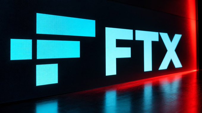 An illuminated FTX logo displayed on a dark wall with red accent lighting.