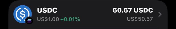 A digital wallet interface displays a USDC balance of 50.57 USDC (US$50.57), with the stablecoin trading at US$1.00 (+0.01%), shown next to its blue logo. The image illustrates the type of crypto balance participants could receive as part of the $50 SOL giveaway promotion.