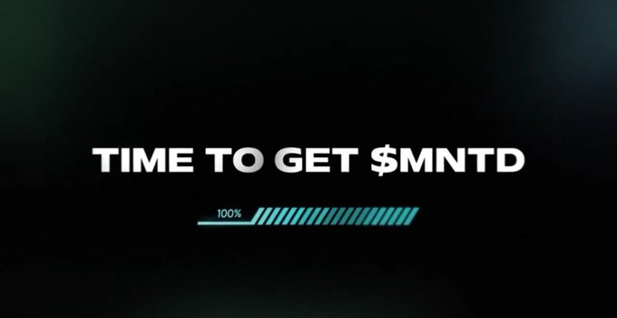 A dark screen with the text 'TIME TO GET $MNTD' above a cyan loading bar filled to 100%.