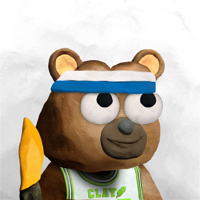 A cartoonish brown bear figure wearing a blue-and-white headband and a green jersey reading "CLAY," holding a gold bowie knife, visually representing the rare Claystone NFT referenced in the post about owning one of only 35 with Gold Bowie Knives.