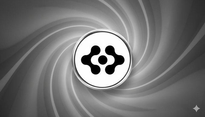 A grayscale image featuring a circular white logo with a black interconnected symbol, set against a swirling metallic background.