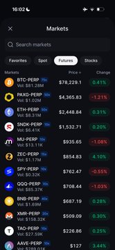 A crypto Markets screen displaying perpetual contracts including BTC-PERP at $78,229.01 (-1.21%), ETH-PERP at $2,448.84 (-1.08%), and SNDK-PERP at $1,532.71 (-2.49%).