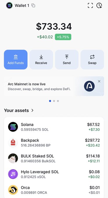 A mobile crypto wallet app screenshot showing a Wallet 1 balance of $733.34 (+5.75%) with assets including Solana ($67.52), Backpack ($297.72), and BULK Staked SOL ($114.18).