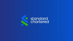 The blue Standard Chartered bank logo featuring its distinctive interlocking ribbon design and white text.