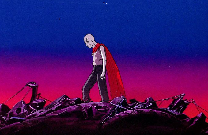 An illustration of a bald superhero with a red cape standing on a pile of rubble beneath a pink and blue gradient sky.