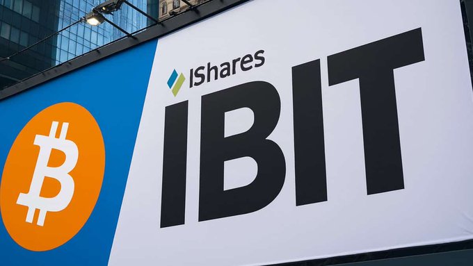Billboard advertisement for the iShares Bitcoin Trust ETF (IBIT) featuring the Bitcoin logo.