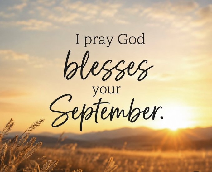 An inspirational graphic with the text "I pray God blesses your September." displayed over a golden sunset over a wheat field with mountains in the distance.