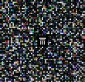 urn of gold and blue, with a black triangle on the left side, against a black background.