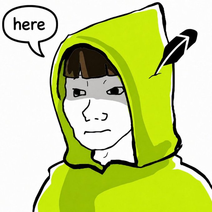 A simple line drawing of a person wearing a green hoodie, with an arrow pointing to the hood and a speech bubble saying 'here'.