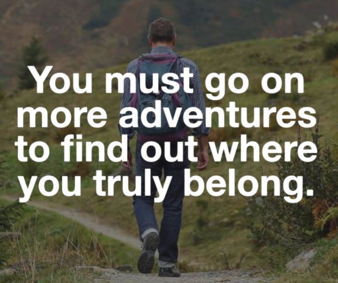 A motivational image showing a man with a backpack walking away on a trail through a grassy landscape, overlaid with the text 'You must go on more adventures to find out where you truly belong.'