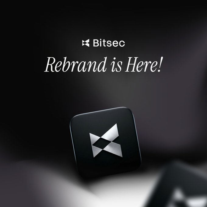The image is a dark, sleek promotional graphic announcing a company rebrand for **Bitsec**, featuring their minimalist X-shaped logo in both small text at the top and as a prominent 3D app-style icon in the center, with the elegant italicized headline **"Rebrand is Here!"** set against a moody black background. It visually introduces the refreshed Bitsec brand identity as the company positions itself as a continuous AI-driven security solution, moving beyond outdated single-audit approaches to provide relentless, expert-level code hardening for mission-critical systems.