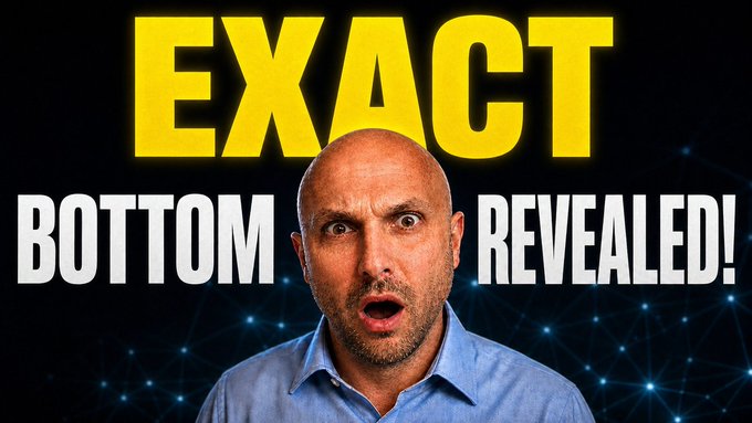 The image features a man with a bald head wearing a blue shirt, who appears surprised or shocked as he looks at the camera. The background of the image is black, which contrasts with the yellow text that reads "EXACT bottom Revealed!". This suggests that there might be an interesting or surprising piece of information about the concept of "bottom" in the context of cryptocurrency or blockchain technology.