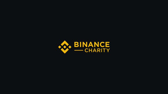 The image displays the Binance Charity logo in gold on a dark background. It relates to the post about Binance donating $3 million to Venezuela following a 7.5 magnitude earthquake on June 24th, as the logo represents the charitable organization that provided the relief funds.
