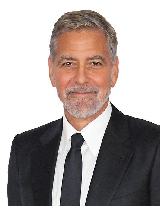 The image features a man wearing a suit, tie, and white shirt with gray hair. He has a beard and mustache, giving him an older appearance. The man appears to be dressed for a formal event or gathering, possibly at the @Litecoin Summit in Amsterdam as indicated by the post's title.