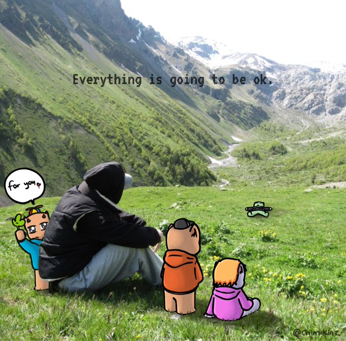 A person sitting in a mountain valley with cartoon characters edited in, with text overlay reading 'Everything is going to be ok.'
