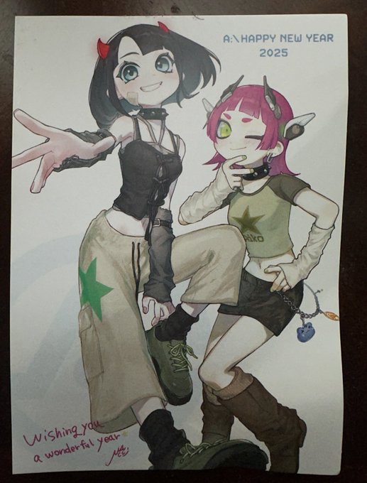A hand-drawn illustration on paper featuring two anime-style female characters with horns, dated 'A: HAPPY NEW YEAR 2025' with handwritten text 'Wishing you a wonderful year' and the artist's signature.