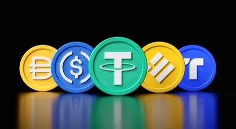 Five cryptocurrency tokens displayed in a row against a black background, featuring the Euro (€), Dollar ($), Tether (₮), Solana (SOL), and another cryptocurrency symbol.