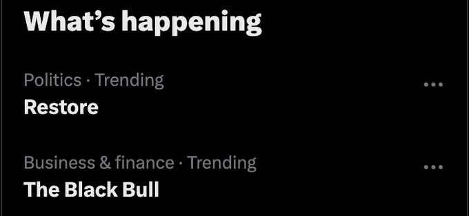 A dark-themed 'What's happening' trending section showing 'Restore' under Politics and 'The Black Bull' under Business & finance.