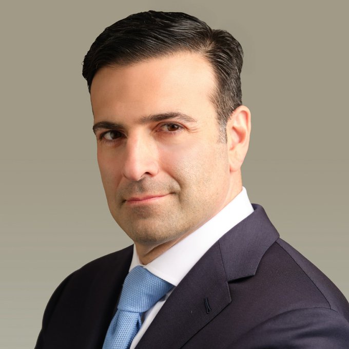 Heath Tarbert, President of Circle, is pictured in a professional headshot wearing a dark suit and light blue tie. The image accompanies a post highlighting his call for Congress to pass the CLARITY Act to complete the U.S. digital asset regulatory framework.