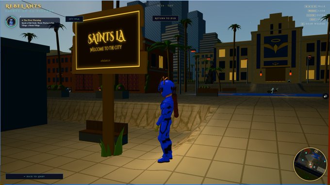 A video game screenshot shows a character in a blue and red striped outfit standing in front of a sign reading 'SAINTS LA WELCOME TO THE CITY' in an urban environment with palm trees.