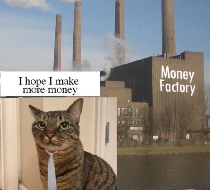 A cat wearing a tie says 'I hope I make more money' in front of a factory labeled 'Money Factory' with smokestacks.