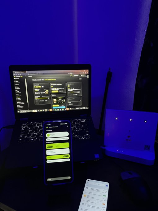 A dimly lit workspace bathed in blue light shows a laptop displaying a website with a "Welcome to the Cloud Solution" banner, alongside a smartphone showing a trading interface with a $13,000 balance and a BTCC-branded device with another phone displaying notifications. The post's casual "Gm Beautiful people" greeting ties into the crypto-trading setup, suggesting the user is starting their day by checking market positions and cloud-based trading platforms.