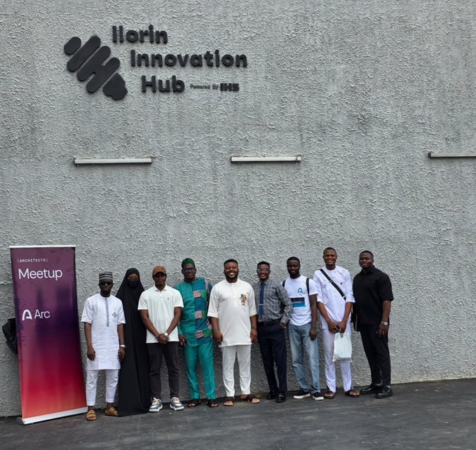 A group poses in front of the "Ilorin Innovation Hub" powered by IHS, with a banner for an "[ARCHITECTS] Meetup" by Arc visible. The post "Build on @arc" suggests this gathering is part of Arc's community initiatives.
