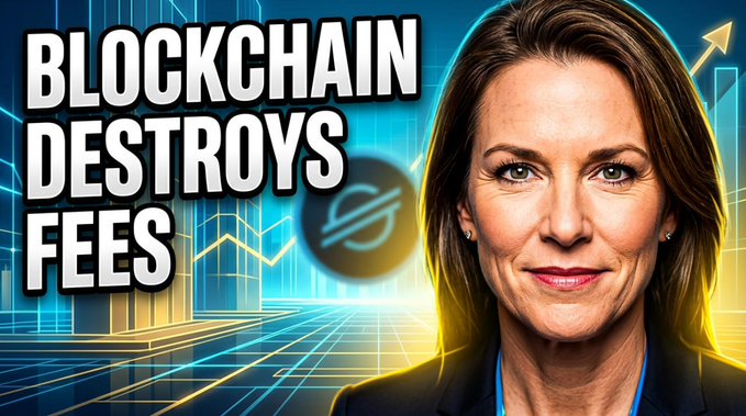 The image features a woman with brown hair wearing a black blazer, smiling at the camera while standing against a blue background. The caption below her reads "Blockchain Destroys Fees", indicating that she is promoting or discussing the disruptive nature of blockchain technology in relation to fees and traditional financial systems.