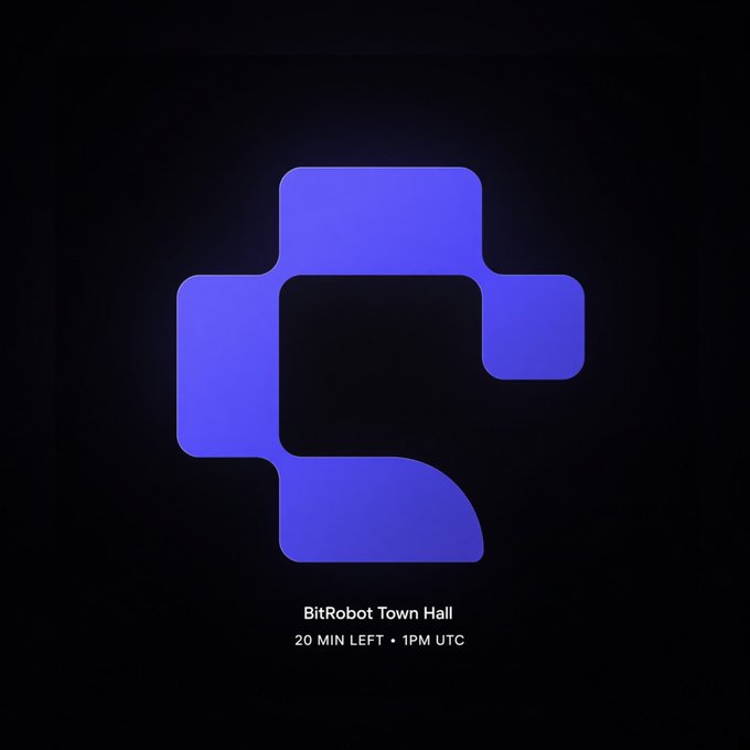 A dark screen displaying a purple BitRobot logo with text indicating 'BitRobot Town Hall' and a countdown '20 MIN LEFT • 1PM UTC'.