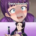 A small anime-style image featuring a purple-haired character and another character holding a phone, with Spanish text '¿Detrás de ti?' (Behind you?).