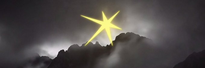 A bright yellow star-like emblem glows above a dark mountain ridge surrounded by mist.
