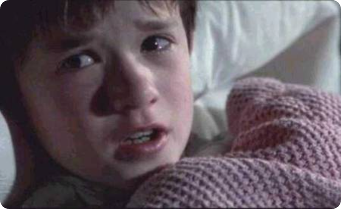 A young child with a teary, distressed expression clutches a pink knitted blanket, conveying a sense of sadness and longing. The image is used to humorously illustrate the post's lament about feeling abandoned or disheartened, comparing the poster's emotional attachment to Polymarket to a child seeking comfort.