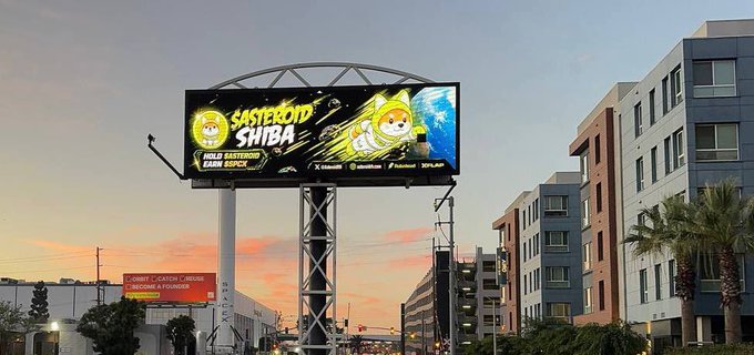 A large billboard promoting "ASTEROID SHIBA" (featuring an astronaut dog and the tagline "HOLD ASTEROID, EARN $APEX") is mounted on a steel structure outside what the post identifies as SpaceX HQ, with a SpaceX security placard visible below at sunset. The scene captures a clear marketing play to capture the attention of SpaceX commuters, aligning with the post's note that "it's a dog's world."