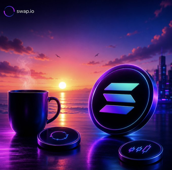 The image features a cup of coffee sitting next to two coin-shaped USB drives with the symbol "SOLANADI" written on them. The background shows a sunset over a city skyline, creating an artistic and visually appealing scene that complements the content of the image. The text in the image reads: "Swapio.io", which is likely the name or logo associated with the swapping platform where these items are displayed.