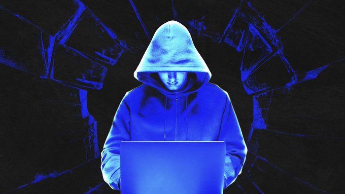 A hooded figure bathed in blue light works intently on a laptop against a shattered background, symbolizing the anonymous hacker who exploited an Ethereum vulnerability and stole $7.73 million worth of rsETH from a Safe wallet user through a manipulated Uniswap v4 hook.