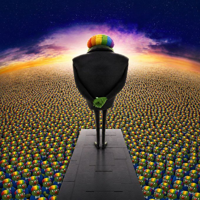 A figure wearing a black suit and a rainbow-colored afro wig stands with hands clasped behind its back on a raised platform, overlooking a vast crowd of identical rainbow-wigged figures stretching to the horizon under a vibrant sunset sky.