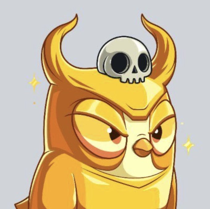 A cartoon illustration of a grumpy-looking yellow owl with large ear tufts, wearing a small white skull on its head, set against a plain background with sparkle accents.