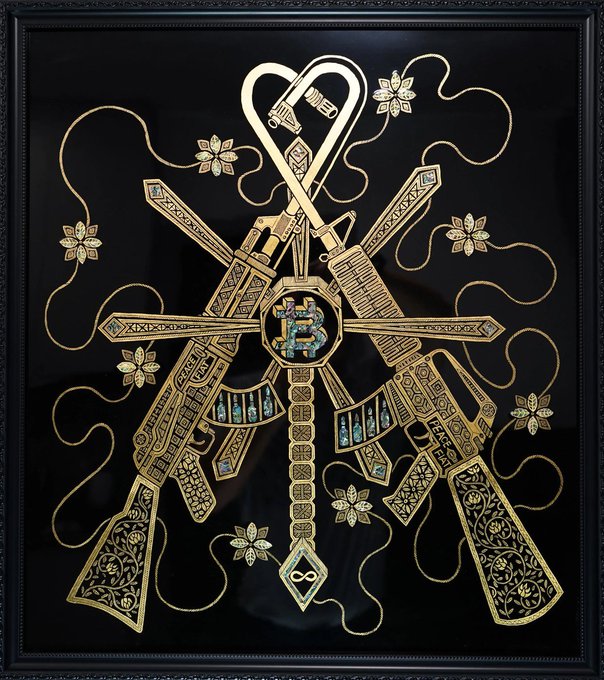 An ornate gold-framed artwork displays crossed rifles, swords, and a handgun with intricate detailing and a central emblem on a black background.