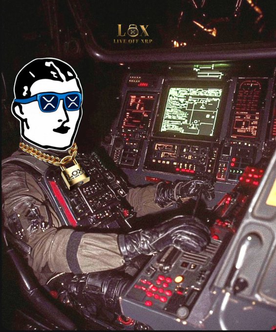 The image features a man wearing sunglasses sitting inside an airplane cockpit. There are several buttons and screens around him, suggesting he is the pilot of the aircraft. The caption below the photo reads "GM XRP fam Weekend or weekday, Still LOXed in.", which implies that the man has been working at the company for some time despite not being online during the indicated weekend (as implied by the phrase "still").
