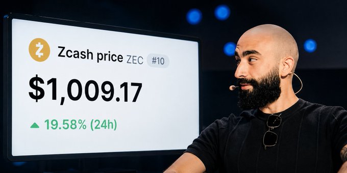 A bearded speaker stands beside a screen showing “Zcash price ZEC #10” at **$1,009.17**, up **19.58% (24h)**. The image celebrates Zcash crossing the $1,000 milestone and suggests Mert believes its value as private “hard money” is far higher.