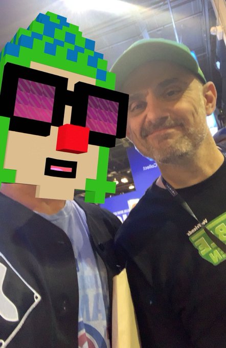 The image features two men standing side by side, both wearing black clothing. One of the men has a big smile on his face while looking directly at the camera, and he appears to be wearing glasses, sunglasses, or goggles as well as a t-shirt with a logo. The other man is also smiling for the picture. There are several texts in the image including "GM Who's riping boxes today?" which refers to the two men, "@Target" suggesting that they may have shopped together at Target, and "@MrBeast". Another text mentions the box of Topps Chrome from @Gmail with a link provided for viewers to see more information about it.