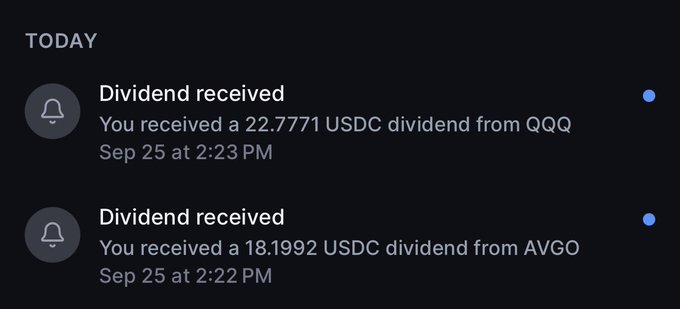 A mobile app notification screen showing dividend received alerts for 22.7771 USDC from QQQ and 18.1992 USDC from AVGO on Sep 25.