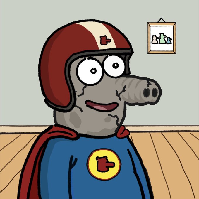 A cartoon illustration shows a character with an elephant trunk wearing a red helmet with a white stripe and a blue superhero outfit with a yellow 't' logo.