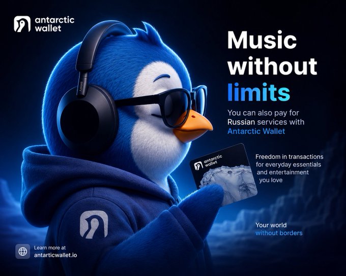 An advertisement for 'antarctic wallet' featuring a 3D animated blue penguin wearing headphones and sunglasses, promoting 'Music without limits' and the ability to pay for Russian services.