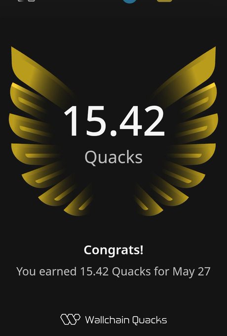 The image shows a screen with a gold-colored logo of an eagle's wing design, along with some text that reads "Congratulations! You earned 15 quacks for May 27." This message congratulates the user who has contributed to the account by adding 15 quacks on May 27. The post emphasizes the importance of consistent participation and engagement in order to gain more visibility within the community.