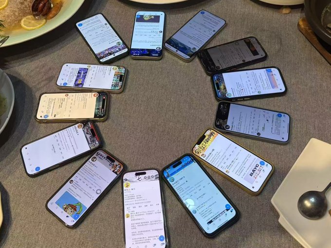 Twelve smartphones are arranged in a circle on a dining table, all displaying the Bored Ape Yacht Club (BAYC) Twitter feed, capturing the "Ape Into Asia" tour's Shanghai afterparty where community members gathered to continue their crypto discussions. The phones, belonging to various BAYC community members including @0xMulight, @lionman888888, and @CryptoPandasim, form a unified display of digital camaraderie around the dinner table.