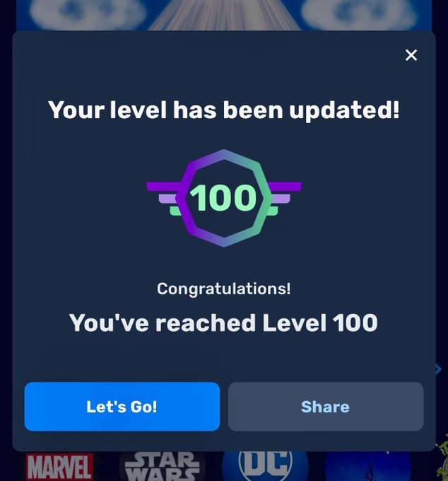 A mobile app notification popup reading 'Your level has been updated! Congratulations! You've reached Level 100' with a purple and green '100' winged badge, and 'Let's Go!' and 'Share' buttons below.